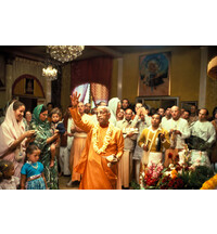 Srila Prabhupada Sprinkles Water from Conchshell